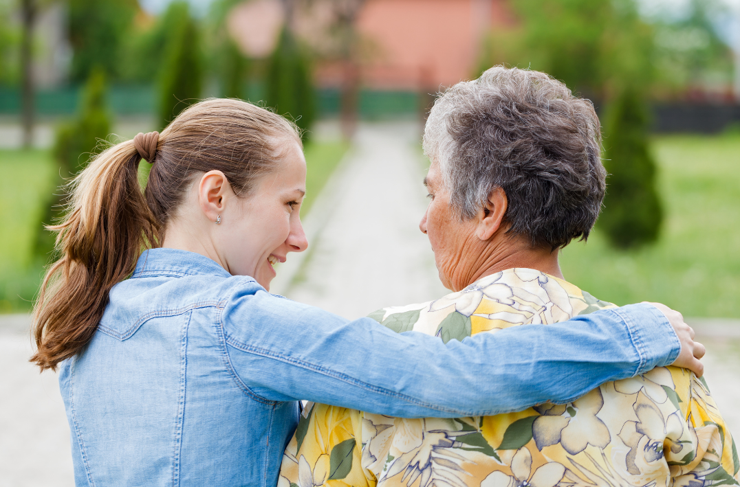 A carer and an elderly who is taking a short term respite care