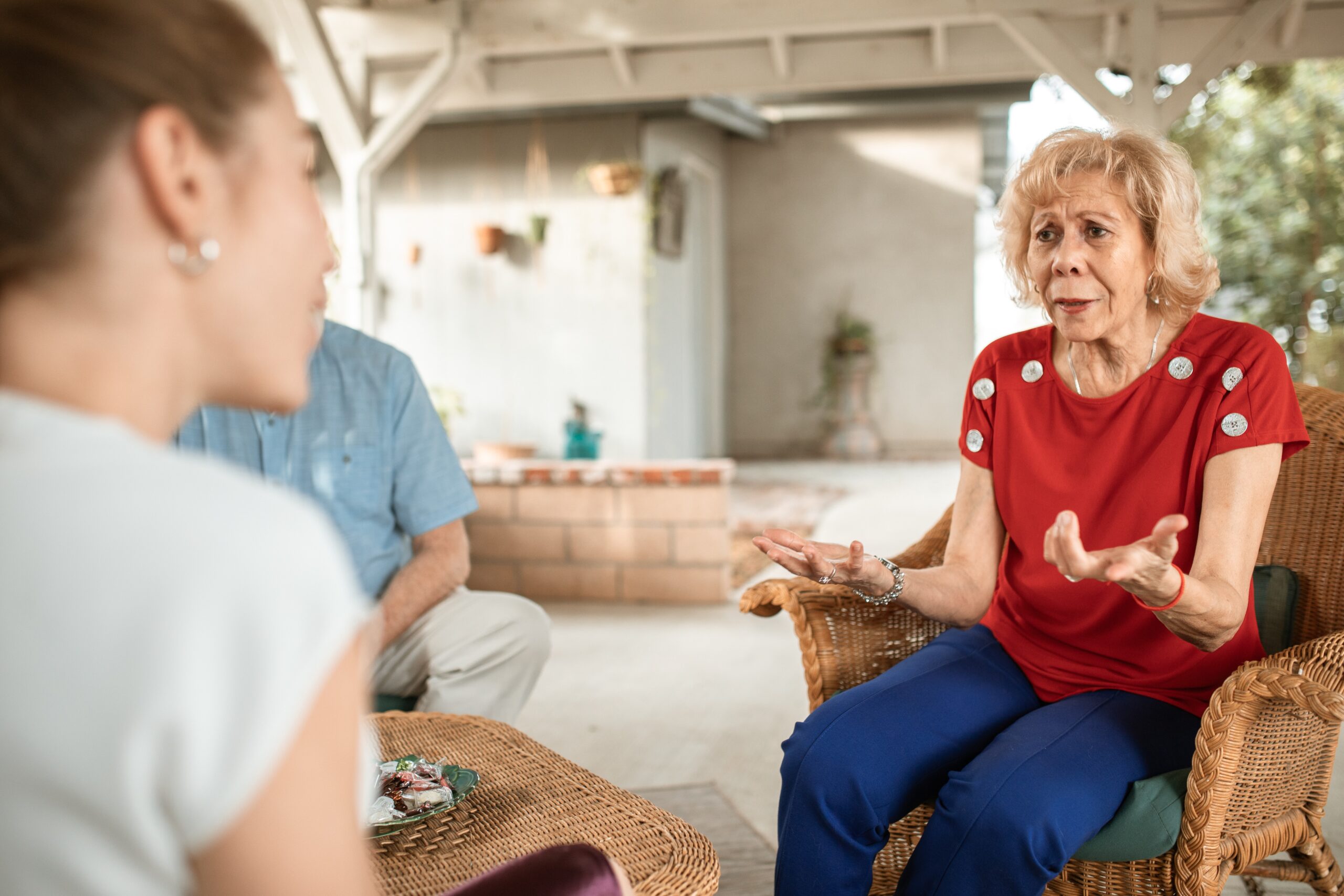 An old woman talking to an aged care consultant