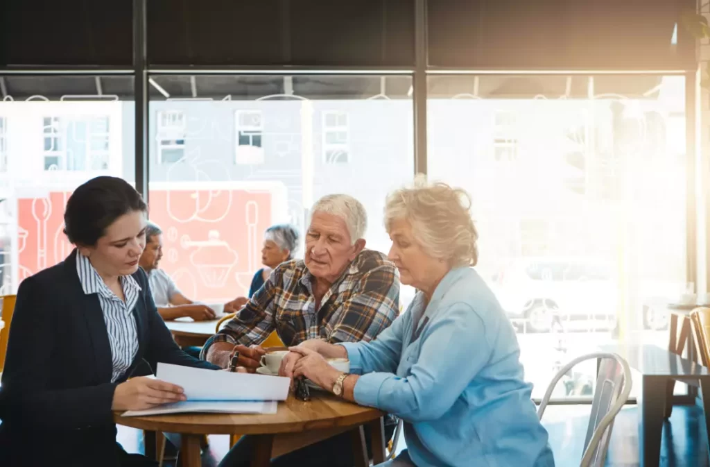 Senior couple meeting up with a financial advisor