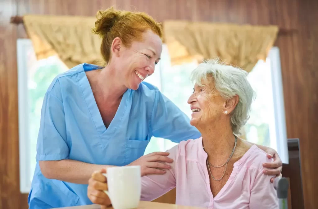 A carer taking care a senior woman